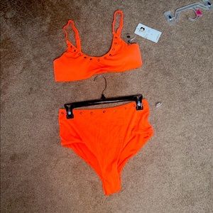 Brand new woman’s size medium bathing suit!